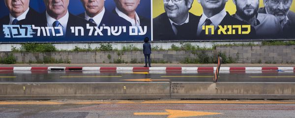 An Ultra-Orthodox Jewish man looks at an elections billboards of the Blue and White party leaders, from left to right, Moshe Yaalon, Benny Gantz, Yair Lapid and Gabi Ashkenazi, alongside a panel on the right showing Prime Minister Benjamin Netanyahu flanked by extreme right politicians, from the left, Itamar Ben Gvir, Bezalel Smotrich and Michael Ben Ari in Bnei Brak, Israel, Saturday, March 16, 2019. Hebrew reads on the left billboard The nation of Israel lives and on the right billboard Kahana Lives in a reference to a banned ultranationalist party in the 1994. - Sputnik International