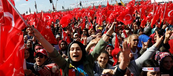 Turkish President Tayyip Erdogan's supporters are seen ahead of a rally for the upcoming local elections, in Istanbul, Turkey March 24, 2019. Turkish President Tayyip Erdogan's supporters are seen ahead of a rally for the upcoming local elections, in Istanbul, Turkey March 24, 2019. - Sputnik International
