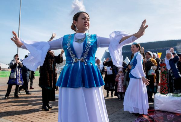 A Girl Wearing a National Outfit During Celebrations of Nowruz at Independence Square in Nur-Sultan A Girl Wearing a National Outfit During Celebrations of Nowruz at Independence Square in Nur-Sultan - Sputnik International