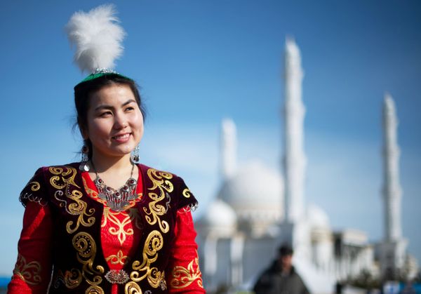 A Girl Wearing a National Outfit During Celebrations of Nowruz at Independence Square in Nur-Sultan A Girl Wearing a National Outfit During Celebrations of Nowruz at Independence Square in Nur-Sultan - Sputnik International