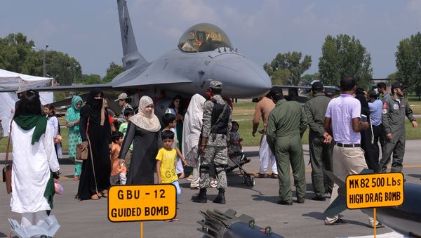 Pakistanis look at a F-16 jet fighter during celebrations to mark Defence Day at the Nur Khan military airbase in Islamabad (File) Pakistanis look at a F-16 jet fighter during celebrations to mark Defence Day at the Nur Khan military airbase in Islamabad (File) - Sputnik International