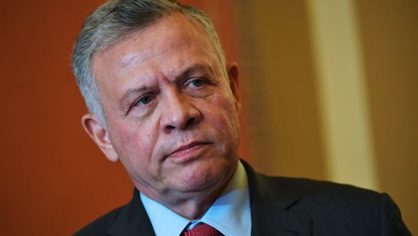 Jordan's King Abdullah II watches as US Speaker of the House Nancy Pelosi speaks ahead of a meeting at the US Capitol in Washington, DC on March 13, 2019 - Sputnik International