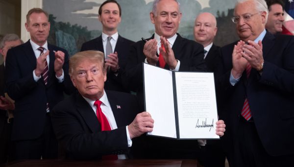 U.S. President Donald Trump holds a proclamation recognizing Israel's sovereignty over the Golan Heights as he is applauded by Israel's Prime Minister Benjamin Netanyahu and others during a ceremony in the Diplomatic Reception Room at the White House in Washington, U.S., March 25, 2019 U.S. President Donald Trump holds a proclamation recognizing Israel's sovereignty over the Golan Heights as he is applauded by Israel's Prime Minister Benjamin Netanyahu and others during a ceremony in the Diplomatic Reception Room at the White House in Washington, U.S., March 25, 2019 - Sputnik International