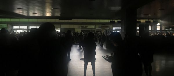 Passengers are seen during a blackout at Simon Bolivar international airport in Caracas, Venezuela March 25, 2019 - Sputnik International
