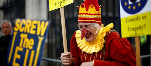 An anti-Brexit protester reacts next to a pro-Brexit protester in London, Britain, March 27, 2019. An anti-Brexit protester reacts next to a pro-Brexit protester in London, Britain, March 27, 2019. - Sputnik International
