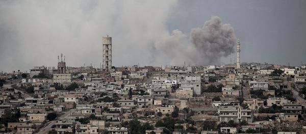 In this Sept. 19, 2013, file photo, smoke rises after a TNT bomb was thrown from a helicopter (archive) - Sputnik International