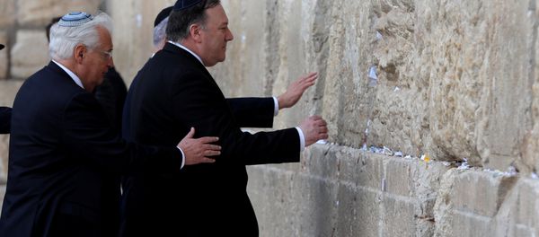 U.S. Secretary of State Mike Pompeo and U.S. Ambassador to Israel David Friedman touch the stones of the Western Wall during a visit to the site in Jerusalem's Old City March 21, 2019 U.S. Secretary of State Mike Pompeo and U.S. Ambassador to Israel David Friedman touch the stones of the Western Wall during a visit to the site in Jerusalem's Old City March 21, 2019 - Sputnik International