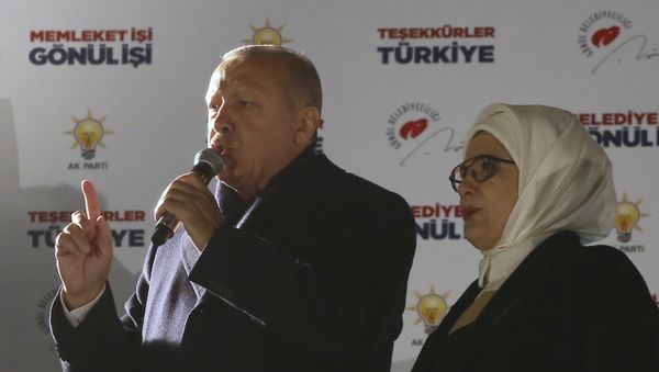 Turkey's President and ruling Justice and Development Party, or AKP, leader Recep Tayyip Erdogan, left, and his wife Emine, greet supporters after the results of the local elections were announced in Ankara, Turkey, early Monday, April 1, 2019. - Sputnik International