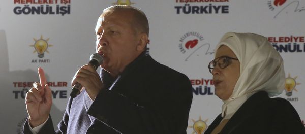 Turkey's President and ruling Justice and Development Party, or AKP, leader Recep Tayyip Erdogan, left, and his wife Emine, greet supporters after the results of the local elections were announced in Ankara, Turkey, early Monday, April 1, 2019. - Sputnik International