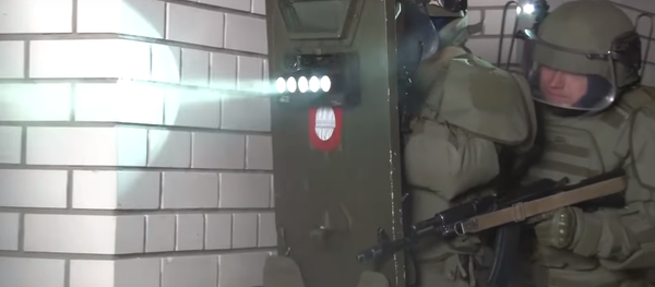 Shield featuring light-based system to disorient enemy militants tested by Russian special forces. Shield featuring light-based system to disorient enemy militants tested by Russian special forces. - Sputnik International