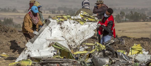 Rescuers work at the scene of an Ethiopian Airlines flight crash near Bishoftu, or Debre Zeit, south of Addis Ababa, Ethiopia, Monday, March 11, 2019 Rescuers work at the scene of an Ethiopian Airlines flight crash near Bishoftu, or Debre Zeit, south of Addis Ababa, Ethiopia, Monday, March 11, 2019 - Sputnik International