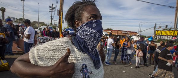 People gather to mourn for rapper Nipsey Hussle, 33, on April 1, 2019 in Los Angeles, California People gather to mourn for rapper Nipsey Hussle, 33, on April 1, 2019 in Los Angeles, California - Sputnik International