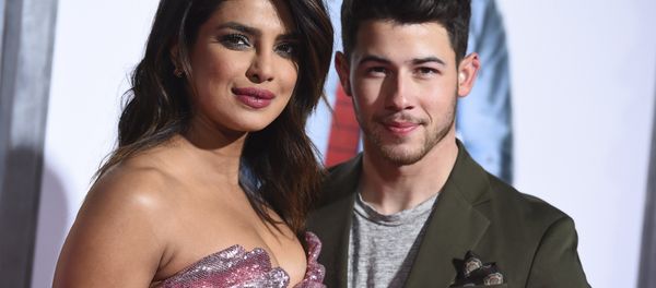 Cast member Priyanka Chopra and her husband Nick Jonas arrive at the Los Angeles premiere of Isn't It Romantic at The Theatre at Ace Hotel on Monday, Feb. 11, 2019 - Sputnik International