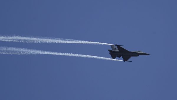 A Pakistani Air Force F-16 fighter jet performs an aerobatic stunt during a rehearsal for the upcoming Pakistan National Day parade in Islamabad, Pakistan, Wednesday, March 20, 2019 A Pakistani Air Force F-16 fighter jet performs an aerobatic stunt during a rehearsal for the upcoming Pakistan National Day parade in Islamabad, Pakistan, Wednesday, March 20, 2019 - Sputnik International