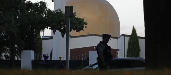 In this March 17, 2019, file photo, a police officer stands guard in front of the Al Noor mosque in Christchurch, New Zealand In this March 17, 2019, file photo, a police officer stands guard in front of the Al Noor mosque in Christchurch, New Zealand - Sputnik International