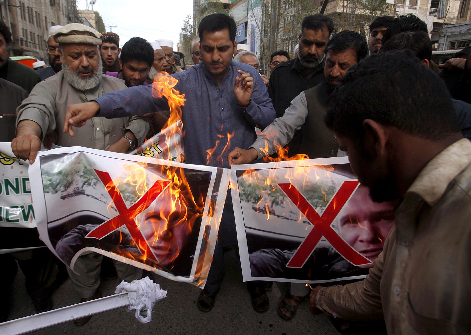 Pakistani traders burn pictures of Brenton Harrison Tarrant, one of the suspects in Christchurch mosques shooting during a demonstration to condemn mosque attack, in Peshawar, Pakistan, Saturday, March 16, 2019 Pakistani traders burn pictures of Brenton Harrison Tarrant, one of the suspects in Christchurch mosques shooting during a demonstration to condemn mosque attack, in Peshawar, Pakistan, Saturday, March 16, 2019 - Sputnik International, 1920, 08.11.2021