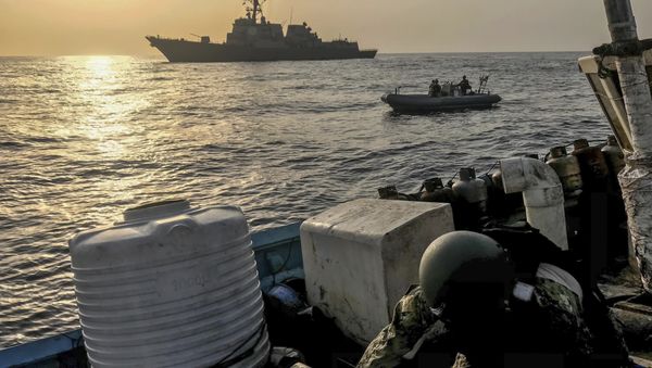 Aug. 30, 2018, a team from the guided-missile destroyer USS Jason Dunham inspects a dhow while conducting maritime security operations Aug. 30, 2018, a team from the guided-missile destroyer USS Jason Dunham inspects a dhow while conducting maritime security operations - Sputnik International
