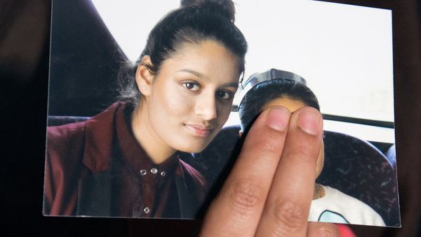 FILE PHOTO: Renu Begum, sister of teenage British girl Shamima Begum, holds a photo of her sister as she makes an appeal for her to return home at Scotland Yard, in London, Britain February 22, 2015. FILE PHOTO: Renu Begum, sister of teenage British girl Shamima Begum, holds a photo of her sister as she makes an appeal for her to return home at Scotland Yard, in London, Britain February 22, 2015. - Sputnik International