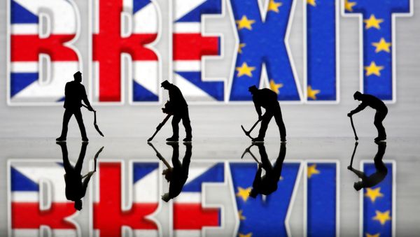 Small toy figures are seen in front of a Brexit logo in this illustration picture, March 30, 2019 Small toy figures are seen in front of a Brexit logo in this illustration picture, March 30, 2019 - Sputnik International