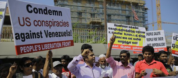 People's Liberation Front, members shout slogans against the U.S. during a protest in solidarity with Venezuelan president Nicolas Maduro outside the U.S. embassy in Colombo, Sri Lanka - Sputnik International