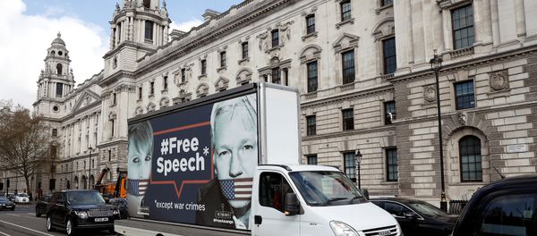 A truck carrying a poster relating to WikiLeaks founder Julian Assange, who has been living at Ecuador's embassy in London, drives through London, Britain April 3, 2019 A truck carrying a poster relating to WikiLeaks founder Julian Assange, who has been living at Ecuador's embassy in London, drives through London, Britain April 3, 2019 - Sputnik International