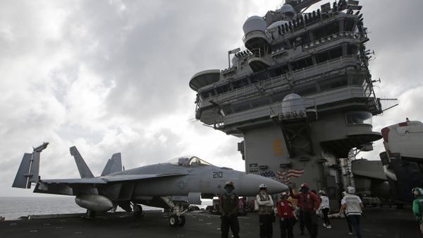 An F/A-18 Super Hornet fighter jet is seen on the deck of the U.S. Navy USS Ronald Reagan in the South China Sea - Sputnik International