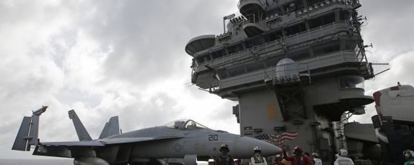 An F/A-18 Super Hornet fighter jet is seen on the deck of the U.S. Navy USS Ronald Reagan in the South China Sea An F/A-18 Super Hornet fighter jet is seen on the deck of the U.S. Navy USS Ronald Reagan in the South China Sea - Sputnik International