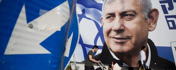 A man walks by an election campaign billboard showing Israel's Prime Minister Benjamin Netanyahu, the Likud party leader, in Tel Aviv, Israel, Sunday, April 7, 2019 - Sputnik International