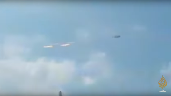 A still from an alleged video of LNA airstrike against Mitiga airport in Tripoli A still from an alleged video of LNA airstrike against Mitiga airport in Tripoli - Sputnik International