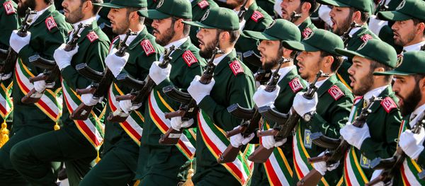 September 22, 2018 members of Iran's Revolutionary Guards Corps (IRGC) march during the annual military parade marking the anniversary of the outbreak of the devastating 1980-1988 war with Saddam Hussein's Iraq, in the capital Tehran - Sputnik International