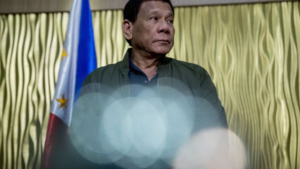 Philippines President Rodrigo Duterte arrives to greet Secretary of State Mike Pompeo at Colonel Jesus Villamor Airbase in Manila, Philippines, Thursday, Feb. 28, 2019 Philippines President Rodrigo Duterte arrives to greet Secretary of State Mike Pompeo at Colonel Jesus Villamor Airbase in Manila, Philippines, Thursday, Feb. 28, 2019 - Sputnik International