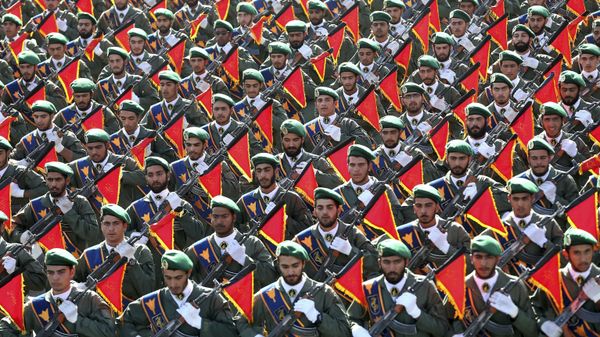 In this Sept. 21, 2016 file photo, Iran's Revolutionary Guard troops march in a military parade marking the 36th anniversary of Iraq's 1980 invasion of Iran, in front of the shrine of late revolutionary founder Ayatollah Khomeini, just outside Tehran, Iran.  - Sputnik International