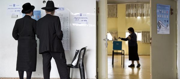 An ultra-Orthodox Jewish woman votes for Israel's parliamentary election at a polling station in Bnei Brak, Israel, Tuesday, April 9, 2019 An ultra-Orthodox Jewish woman votes for Israel's parliamentary election at a polling station in Bnei Brak, Israel, Tuesday, April 9, 2019 - Sputnik International