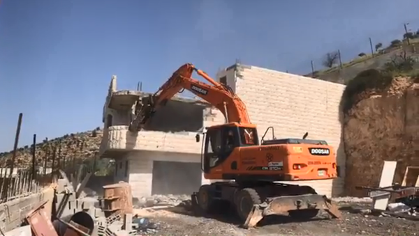 The Palestinian Zreina family is forced by the IDF to demolish their own family home in Bin Ouna, West Bank The Palestinian Zreina family is forced by the IDF to demolish their own family home in Bin Ouna, West Bank - Sputnik International