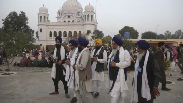 In this Nov. 28, 2018 file photo, Indian Sikh pilgrims visit Gurdwara Darbar Sahib, the shrine of their spiritual leader Guru Nanak Dev in Kartarpur, Pakistan - Sputnik International
