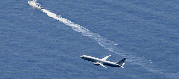 A Japan Coast Guard vessel and a U.S. military aircraft conduct rescue and search operations at the site where an Air Self-Defense Force's F-35A stealth fighter jet crashed during an exercise on April 9, 2019, off Aomori prefecture, Japan, in this photo taken by Kyodo April 10, 2019 A Japan Coast Guard vessel and a U.S. military aircraft conduct rescue and search operations at the site where an Air Self-Defense Force's F-35A stealth fighter jet crashed during an exercise on April 9, 2019, off Aomori prefecture, Japan, in this photo taken by Kyodo April 10, 2019 - Sputnik International