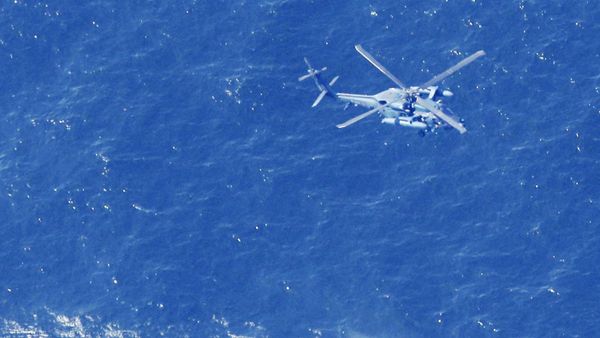 A Japan Air Self-Defense Force helicopter conducts rescue and search operation at the site where an Air Self-Defense Force's F-35A stealth fighter jet crashed during an exercise on April 9, 2019, off Aomori prefecture, Japan, in this photo taken by Kyodo April 10 2019 - Sputnik International