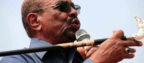 Sudan's President Omar al-Bashir addresses supporters during his visit to the war-torn Darfur region, in Bilal, Darfur, Sudan September 22, 2017 - Sputnik International