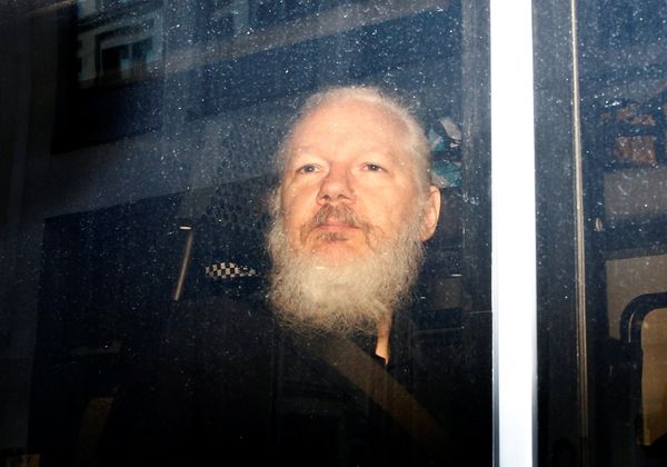 WikiLeaks founder Julian Assange is seen in a police van, after he was arrested by British police, in London, Britain April 11, 2019 - Sputnik International