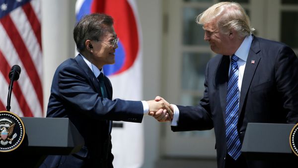 U.S. President Donald Trump (R) greets South Korean President Moon Jae-in U.S. President Donald Trump (R) greets South Korean President Moon Jae-in - Sputnik International