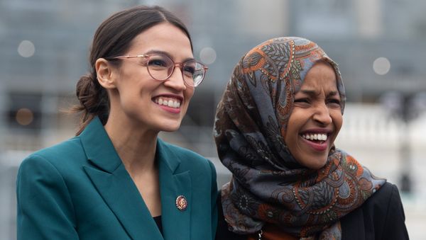 US Representative Alexandria Ocasio-Cortez, Democrat of New York, and US Representative Ilhan Omar (R), Democrat of Minnesota, attend a press conference calling on Congress to cut funding for US Immigration and Customs Enforcement (ICE) and to defund border detention facilities, outside the US Capitol in Washington, DC, February 7, 2019. US Representative Alexandria Ocasio-Cortez, Democrat of New York, and US Representative Ilhan Omar (R), Democrat of Minnesota, attend a press conference calling on Congress to cut funding for US Immigration and Customs Enforcement (ICE) and to defund border detention facilities, outside the US Capitol in Washington, DC, February 7, 2019. - Sputnik International