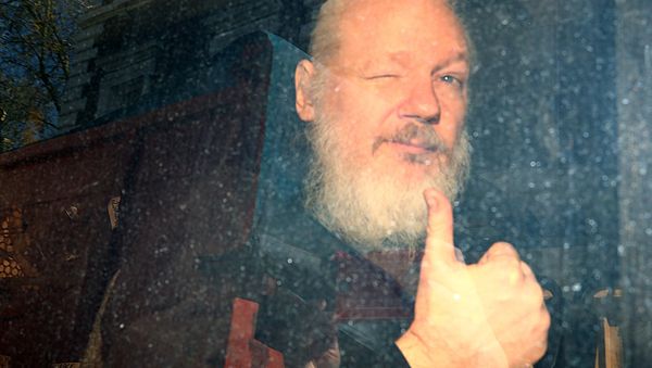 WikiLeaks founder Julian Assange arrives at the Westminster Magistrates Court, after he was arrested in London, Britain April 11, 2019. - Sputnik International