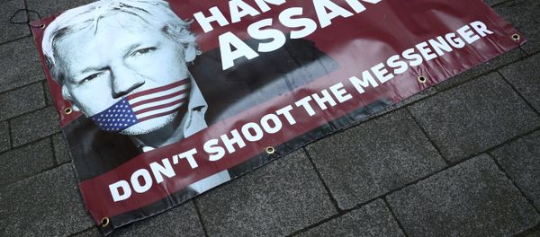 Banners in support of arrested WikiLeaks founder Julian Assange are seen on the pavement in front of Westminster Magistrates Court in London Banners in support of arrested WikiLeaks founder Julian Assange are seen on the pavement in front of Westminster Magistrates Court in London - Sputnik International