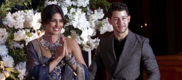 Bollywood actress Priyanka Chopra and musician Nick Jonas pose for photographs at their wedding reception in Mumbai, India, Wednesday, Dec 19, 2018 Bollywood actress Priyanka Chopra and musician Nick Jonas pose for photographs at their wedding reception in Mumbai, India, Wednesday, Dec 19, 2018 - Sputnik International