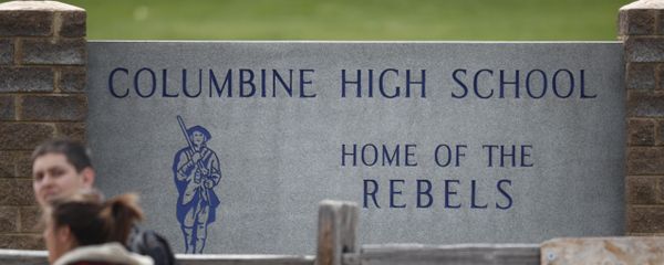 Students leave Columbine High School late Tuesday, April 16, 2019, in Littleton, Colo. Following a lockdown at Columbine High School and other Denver area schools, authorities say they are looking for a woman suspected of making threats. Students leave Columbine High School late Tuesday, April 16, 2019, in Littleton, Colo. Following a lockdown at Columbine High School and other Denver area schools, authorities say they are looking for a woman suspected of making threats. - Sputnik International