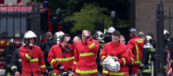 Firefighters leave Notre-Dame Cathedral after a fire devastated large parts of the gothic gem in Paris, France April 16, 2019 - Sputnik International