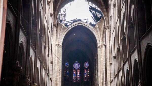 A view of the damaged roof of Notre-Dame de Paris in the aftermath of a fire that devastated the cathedral during the visit of French Interior Minister Christophe Castaner (not pictured) in Paris, France, April 16, 2019 - Sputnik International