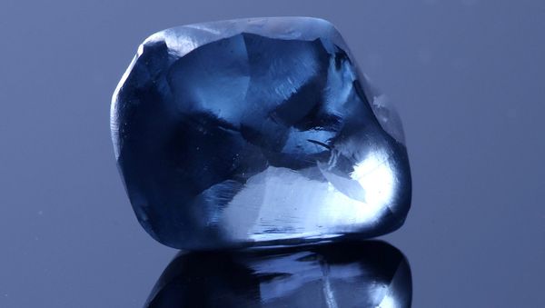 A blue diamond, weighing over 20 carats, is seen in this undated handout picture released by Okavango Diamond Company in Gaborone - Sputnik International