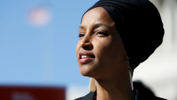 Rep. Ilhan Omar (D-MN) speaks about Trump administration policies toward Muslim immigrants and her own immigrant background at a news conference by members of the U.S. Congress to announce legislation to repeal President Trump’s existing executive order blocking travel from majority Muslim countries outside the U.S. Capitol in Washington, U.S., April 10, 2019 - Sputnik International