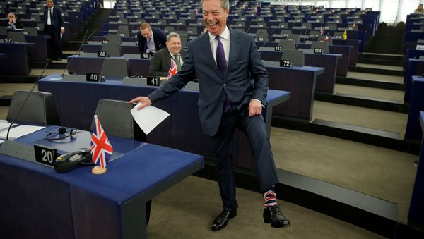 Brexit campaigner and Member of the European Parliament Nigel Farage arrives to attend a debate on the outcome of the latest European Summit on Brexit, at the European Parliament in Strasbourg, France, April 16, 2019 Brexit campaigner and Member of the European Parliament Nigel Farage arrives to attend a debate on the outcome of the latest European Summit on Brexit, at the European Parliament in Strasbourg, France, April 16, 2019 - Sputnik International